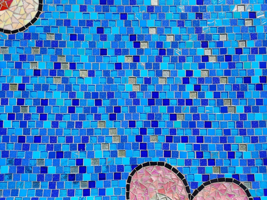 Seamless mirror wallpaper pattern — Geometry by wallpaper⁶ — base photo: A colorful mosaic tile wall with various shades of blue creating a vibrant pattern.