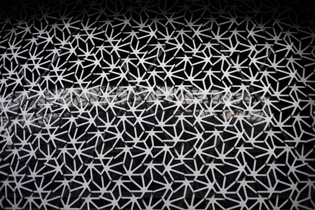Seamless diamond wallpaper pattern — Origami by wallpaper⁶ — base photo: A black and white photo of a pattern