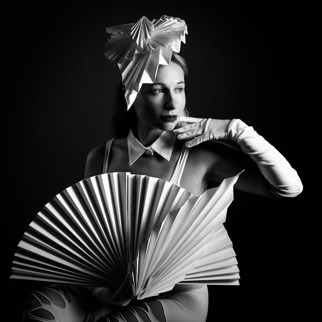 Seamless chevron wallpaper pattern — Origami by wallpaper⁶ — base photo: Striking black and white portrait featuring a woman with elegant origami accessories.