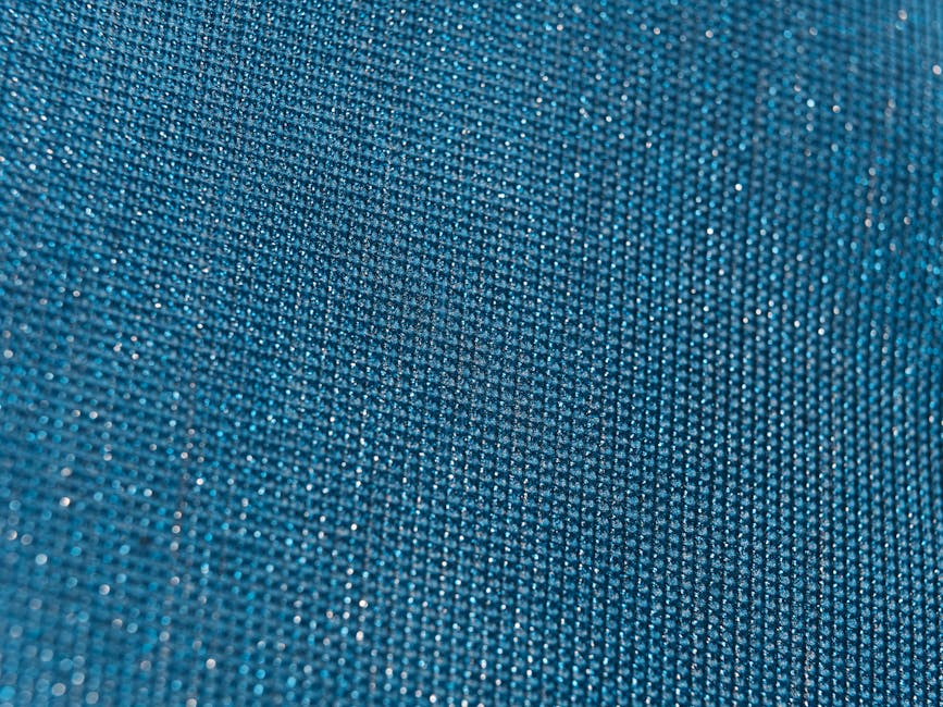Seamless diamond wallpaper pattern — Glitch by wallpaper⁶ — base photo: Close-up view of sparkling blue textured fabric with shimmering quality.