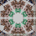A seamless kaleidoscope wallpaper pattern featuring amber and dark crystalline shapes in a radial Chemistry-inspired design.