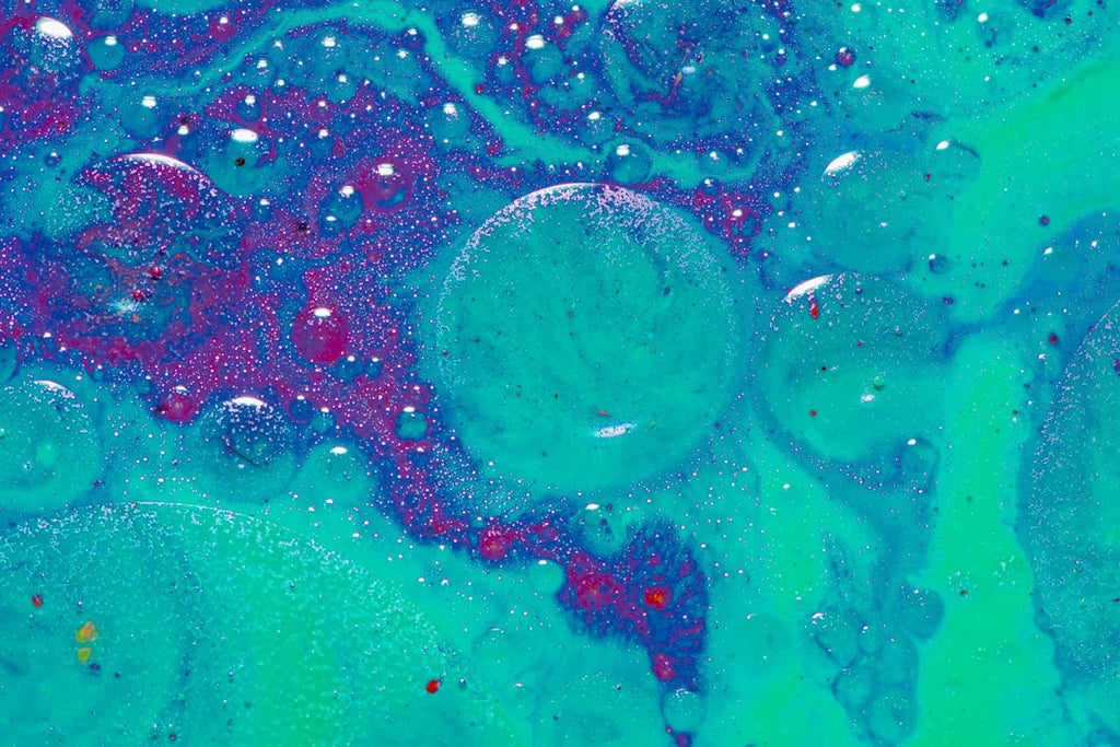 Physics Pinwheel wallpaper pattern — base photo: a close up of a blue and purple liquid