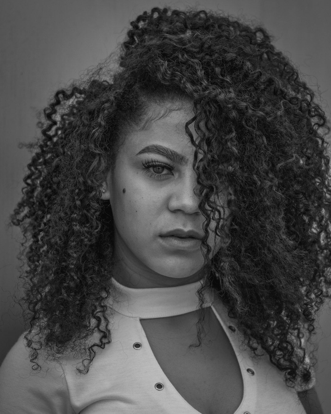 Seamless kaleidoscope wallpaper pattern — Geometry by wallpaper⁶ — base photo: a black and white photo of a woman with curly hair