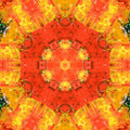 A radial kaleidoscope pattern in shades of gold and amber, resembling a glowing geometric mandala with sharp light filaments.