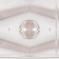 A symmetrical mirror pattern of deep green mineral layers and crystalline textures in a balanced, rhythmic layout.