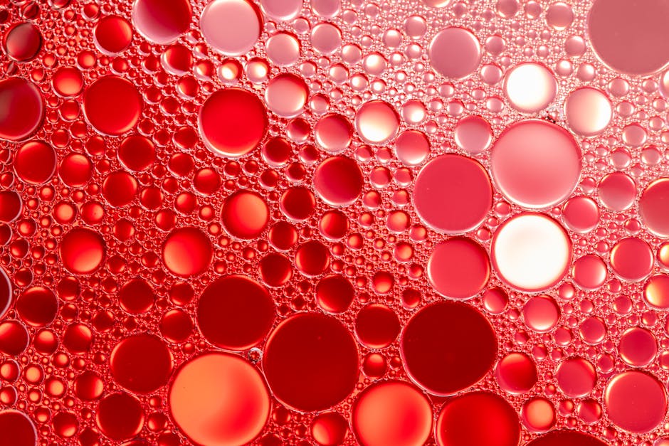 Chemistry Brick wallpaper pattern — base photo: Vibrant red big and small shining circles in pattern on bright decorative cover