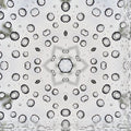 A radial kaleidoscope pattern of swirling blue and white weather systems and isobar lines in a symmetrical mandala style.