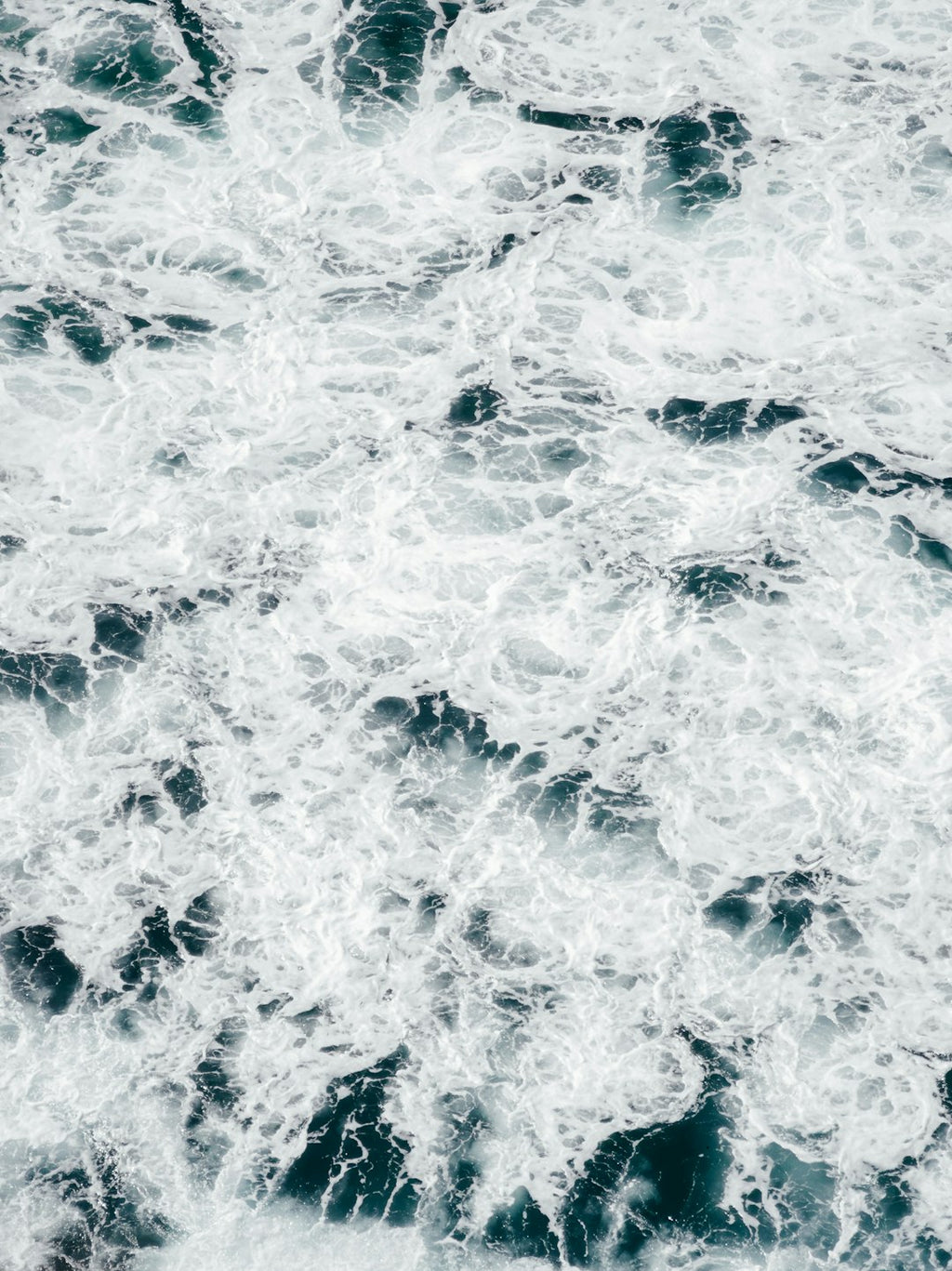 Oceanography Horizontal Strip wallpaper pattern — base photo: A man riding a surfboard on top of a wave