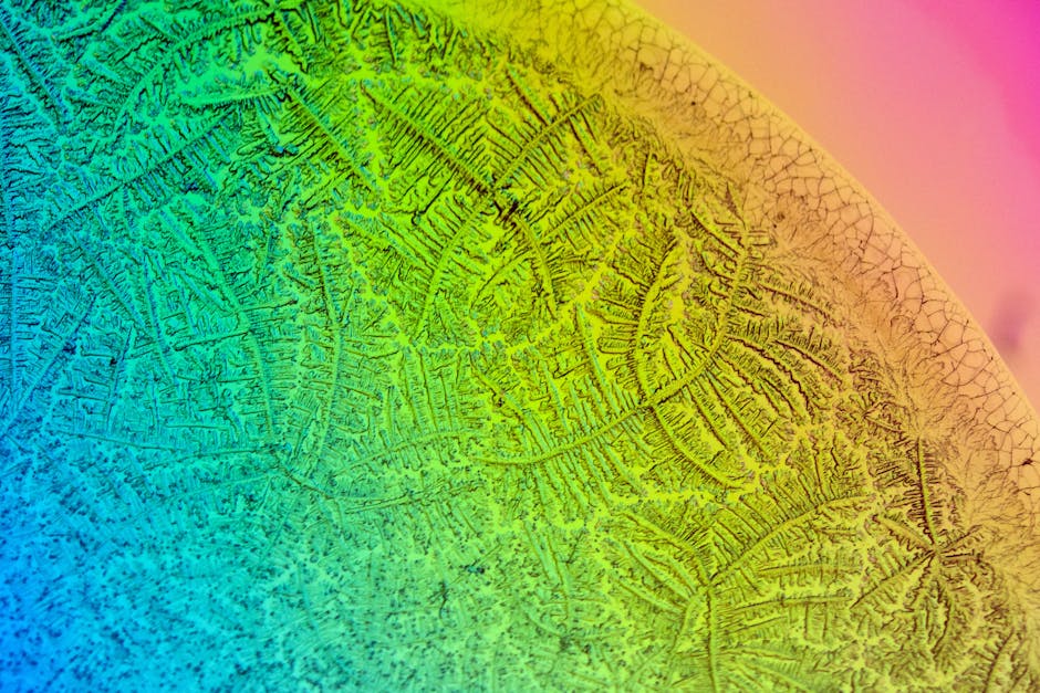 Algorithms Diamond wallpaper pattern — base photo: A colorful abstract pattern with textured details and rainbow gradient hues.