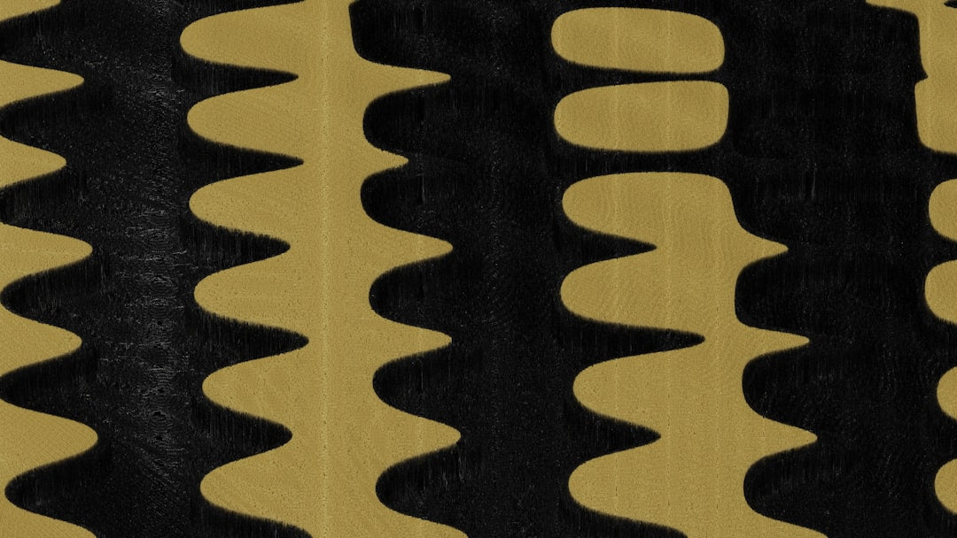 Seamless kaleidoscope wallpaper pattern — Arithmetic by wallpaper⁶ — base photo: A close up of a black and yellow wallpaper