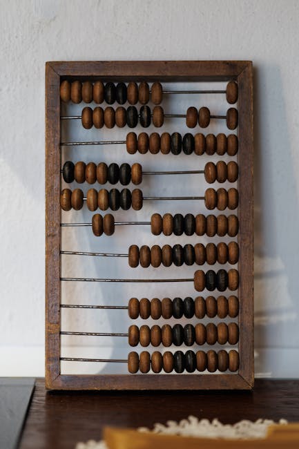 Seamless hex wallpaper pattern — Arithmetic by wallpaper⁶ — base photo: Vintage wooden abacus with brown and black beads on a white background.