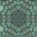 A close-up of a broken fence against a blue sky, transformed into an abstract stained glass pattern using kaleidoscope symmetry.