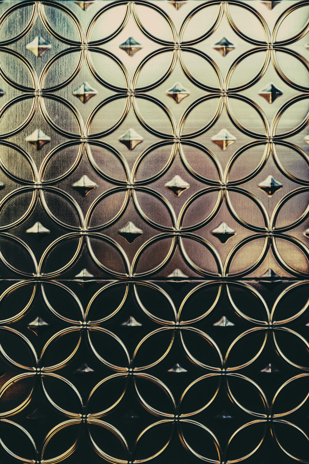 Seamless hex wallpaper pattern — Stained Glass by wallpaper⁶ — base photo: Metal tiles creating a pattern on a wall