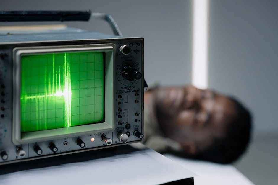 Seamless mirror wallpaper pattern — Medicine by wallpaper⁶ — base photo: Close-up of a vintage oscilloscope displaying a green waveform next to a blurred person.