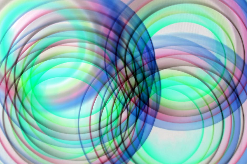 Seamless kaleidoscope wallpaper pattern — Glitch by wallpaper⁶ — base photo: Colorful overlapping circles create a vibrant abstract design with a lively and energetic feel.