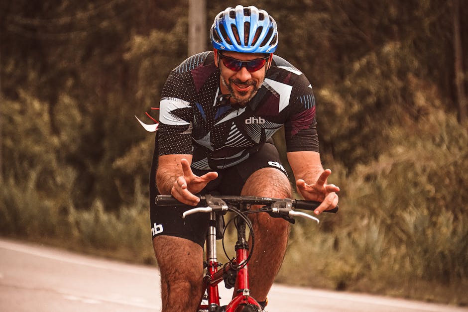 Seamless mirror wallpaper pattern — Biochemistry by wallpaper⁶ — base photo: A dynamic shot of a male cyclist with a blue helmet riding on a rural road, exuding energy and enthu