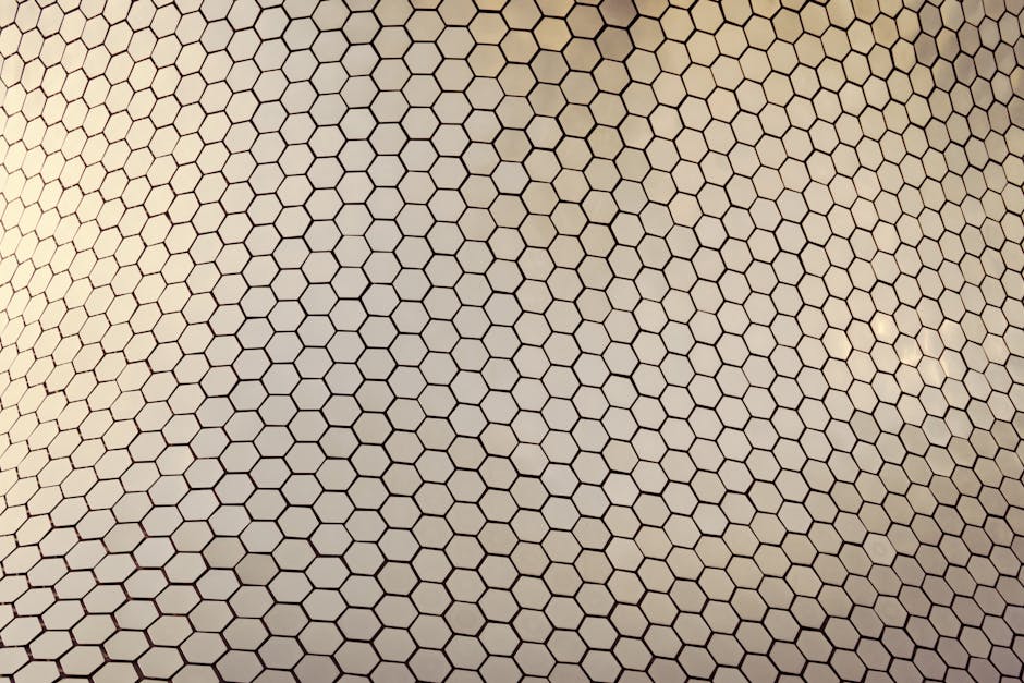 Seamless mirror wallpaper pattern — Geometry by wallpaper⁶ — base photo: Close-up of the hexagonal patterned facade of Museo Soumaya in Mexico City.