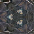 A seamless Hex symmetry pattern featuring abstract reflections of blue and red stained glass in dark water.
