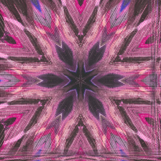 An intricate kaleidoscope pattern of amber and black shards forming a glowing, radial geometric symmetry.