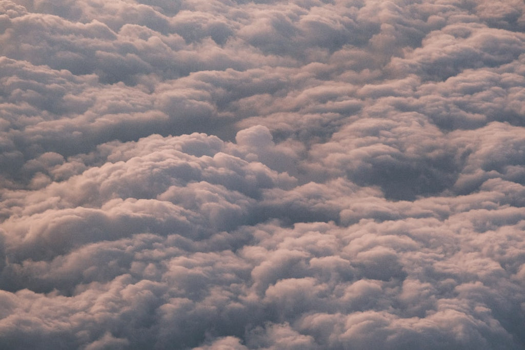 Meteorology Kaleidoscope wallpaper pattern — base photo: A view of the clouds from an airplane window