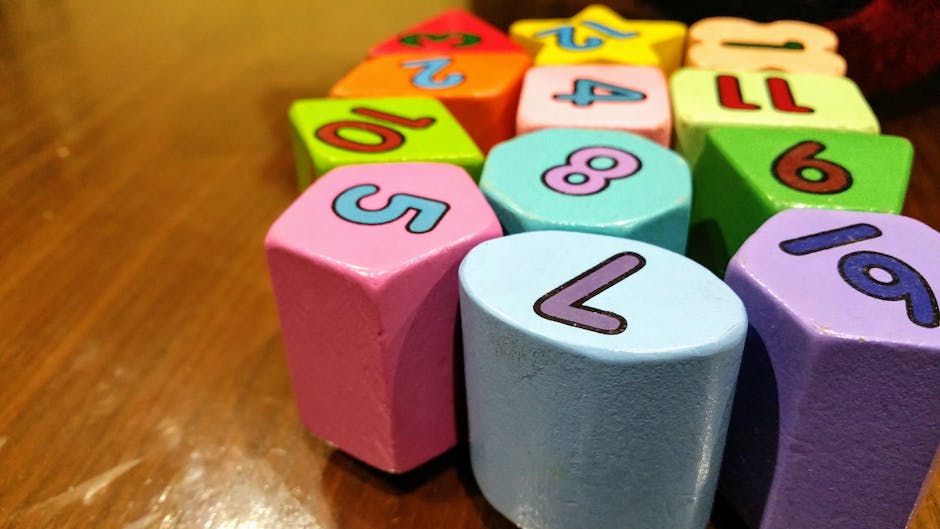 Seamless hex wallpaper pattern — Arithmetic by wallpaper⁶ — base photo: Close-up of colorful wooden blocks with numbers for educational fun.