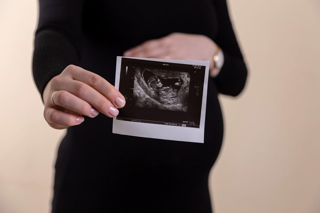 Seamless hex wallpaper pattern — Medicine by wallpaper⁶ — base photo: Cropped image of young pregnant woman holding ultrasound picture on belly.