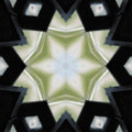 Diamond-shaped leaded glass panes arranged in a symmetrical kaleidoscope pattern with a blurred green background.