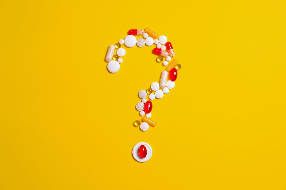 Seamless hex wallpaper pattern — Biochemistry by wallpaper⁶ — base photo: Assorted pills and capsules arranged in a question mark on a bright yellow background symbolizing me