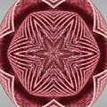 A seamless kaleidoscope pattern of dark 3D isometric cubes and prisms with sharp silver edges and deep black facets.
