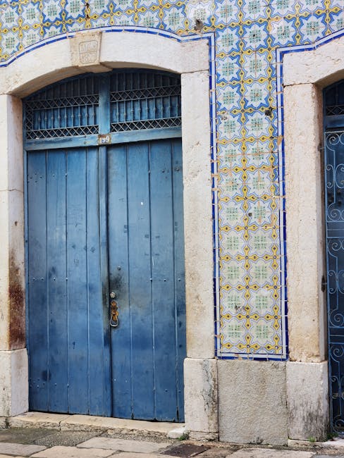 Seamless kaleidoscope wallpaper pattern — Geometry by wallpaper⁶ — base photo: A picturesque blue door with traditional Portuguese tiles in Lisbon, offering a rustic and artistic 
