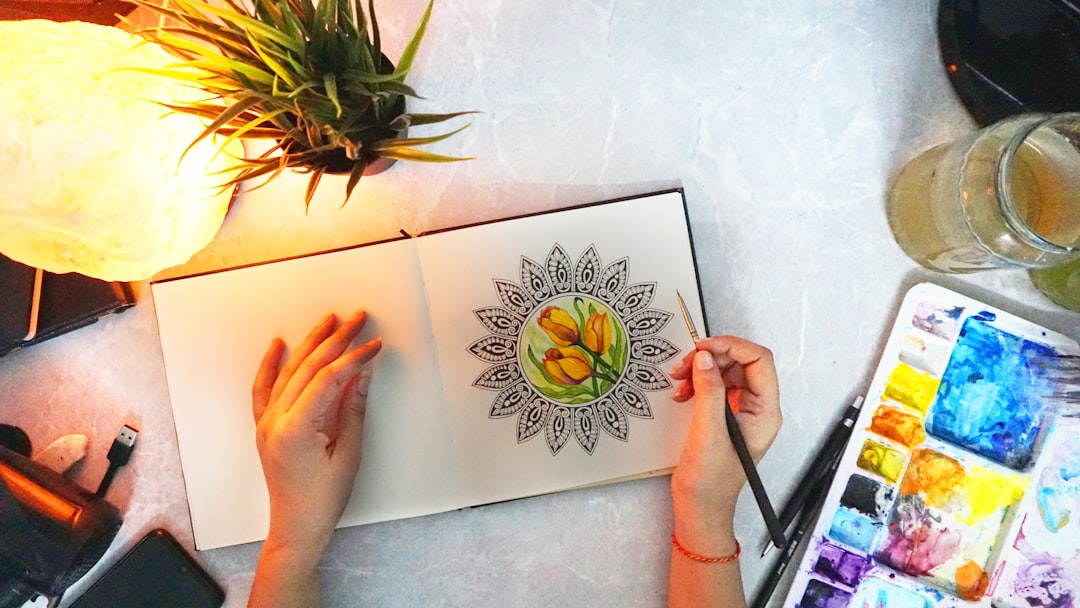 Seamless kaleidoscope wallpaper pattern — Calligraphy by wallpaper⁶ — base photo: person holding white and green flower painting