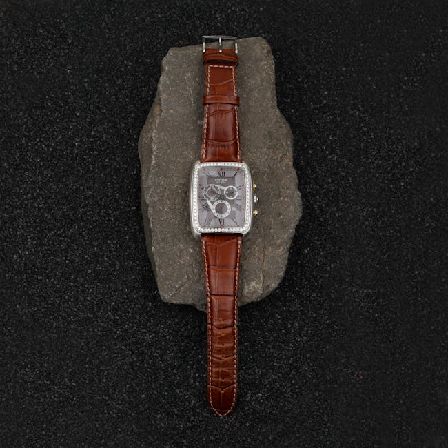 Seamless brick wallpaper pattern — Cartography by wallpaper⁶ — base photo: A luxurious wristwatch with a brown leather strap elegantly placed on a stone backdrop.