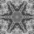 A seamless kaleidoscope pattern of swirling, metallic 3D ribbons with iridescent highlights and deep shadows in a topology style.