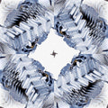 A seamless 3D pattern of dark gray isometric blocks arranged in a four-way rotation, creating a deep geometrical relief.