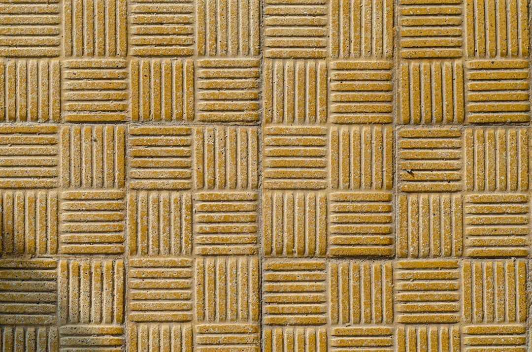 Seamless kaleidoscope wallpaper pattern — Biochemistry by wallpaper⁶ — base photo: brown woven textile in close up photography