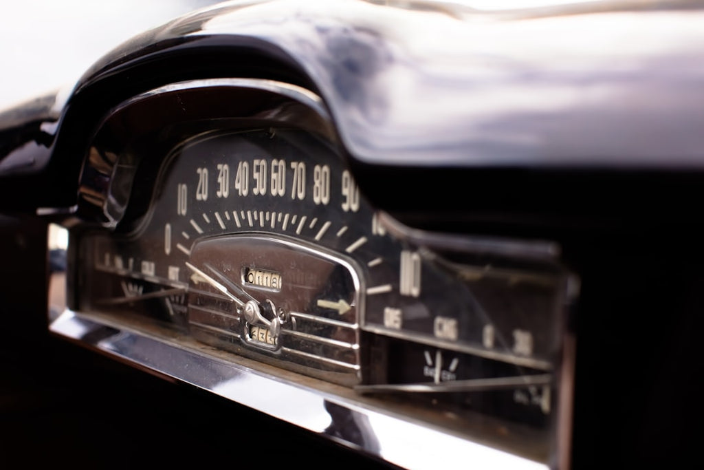 Seamless kaleidoscope wallpaper pattern — Arithmetic by wallpaper⁶ — base photo: a close up of a speedometer on a car