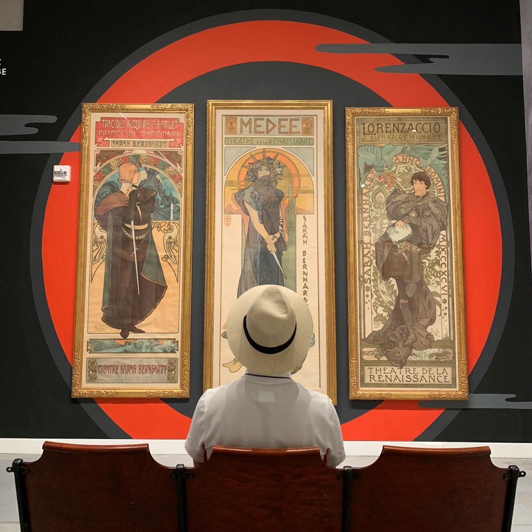 WALLPAPER⁶ — seamless diamond pattern from databending art, Glitch Art — base photo: Alphonse Mucha's posters being exhibited at Poster House in New York.